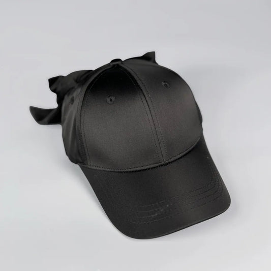 Marissa Cap, Sort